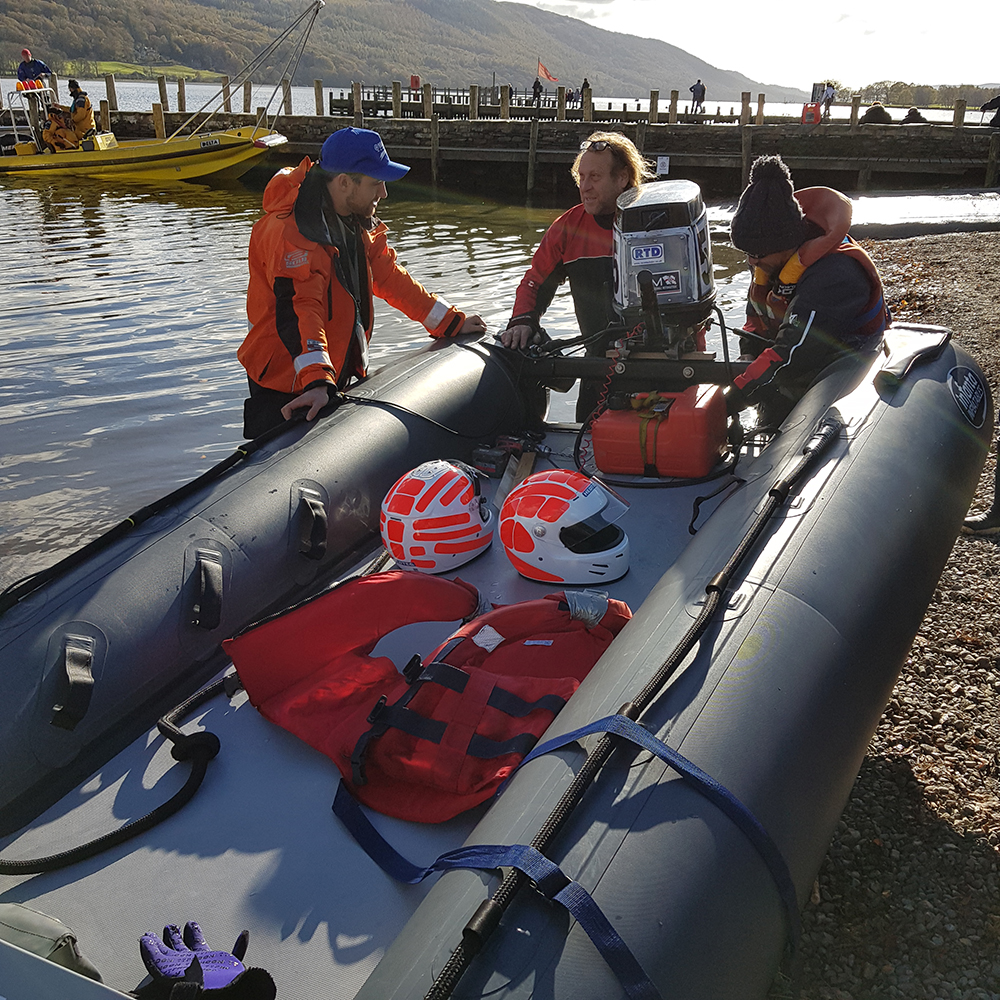 A boat being fixed waiting to race